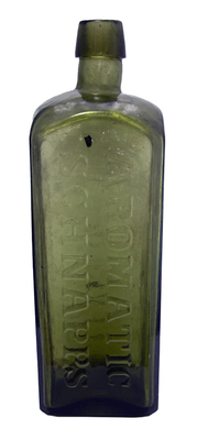 Udolpho Wolfe&#039;s Aromatic Schnapps Bottle